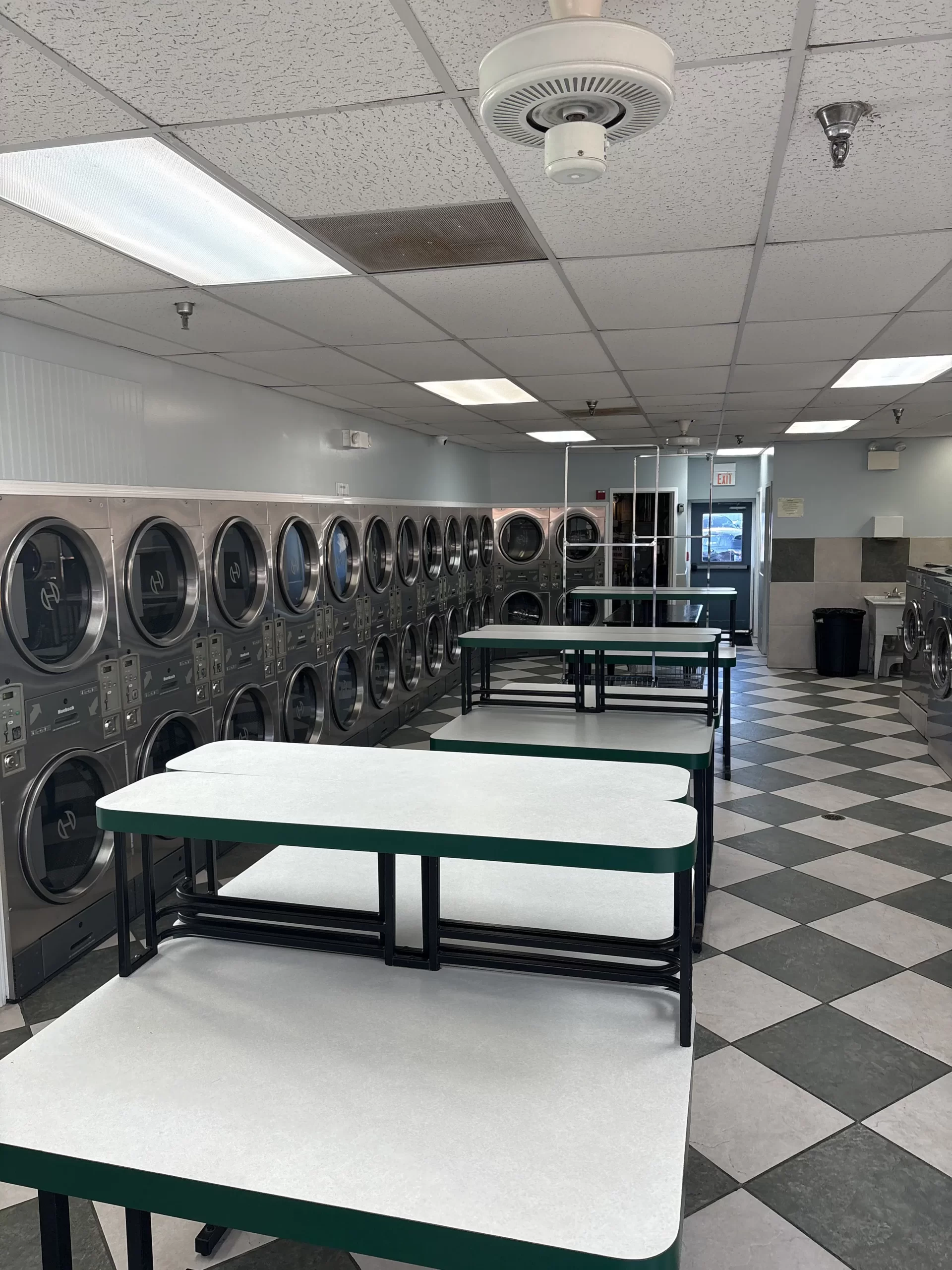 Have a closer look at the Hoffman Estates Laundromat Laundry Drop-Off Service folding tables.